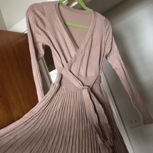 Pleated beige sweater faux-wrap dress